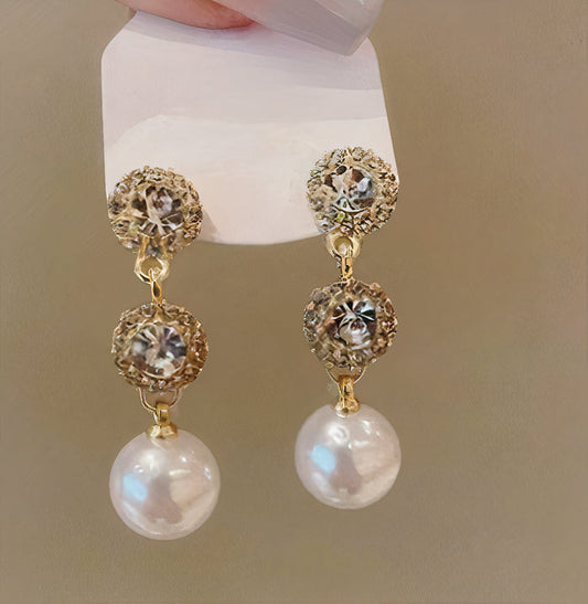 Dangling Rose Gold Pearl Earrings